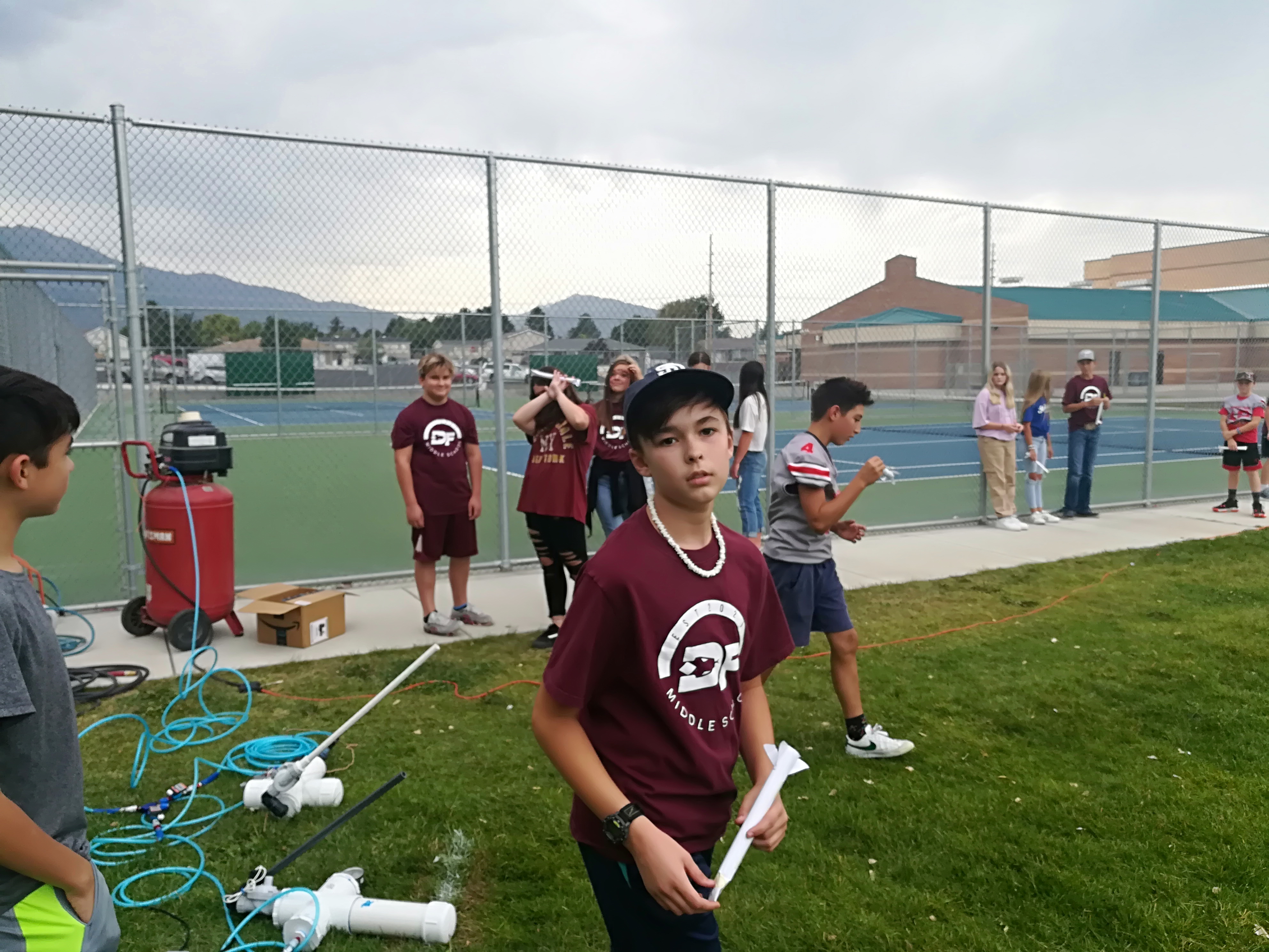 Students gathered to launch paper rockets