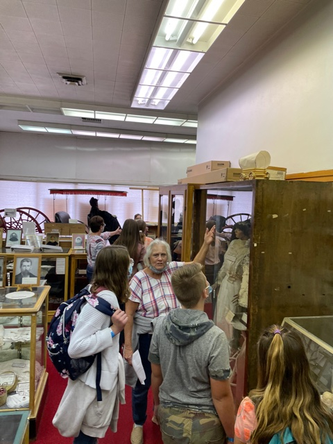 Students are given a tour of the Daughters of the Utah Pioneers museum in Spanish Fork