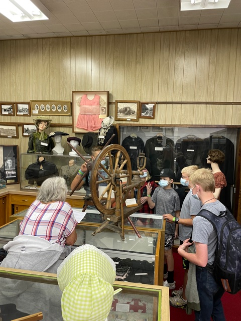 Students are given a tour of the Daughters of the Utah Pioneers museum in Spanish Fork