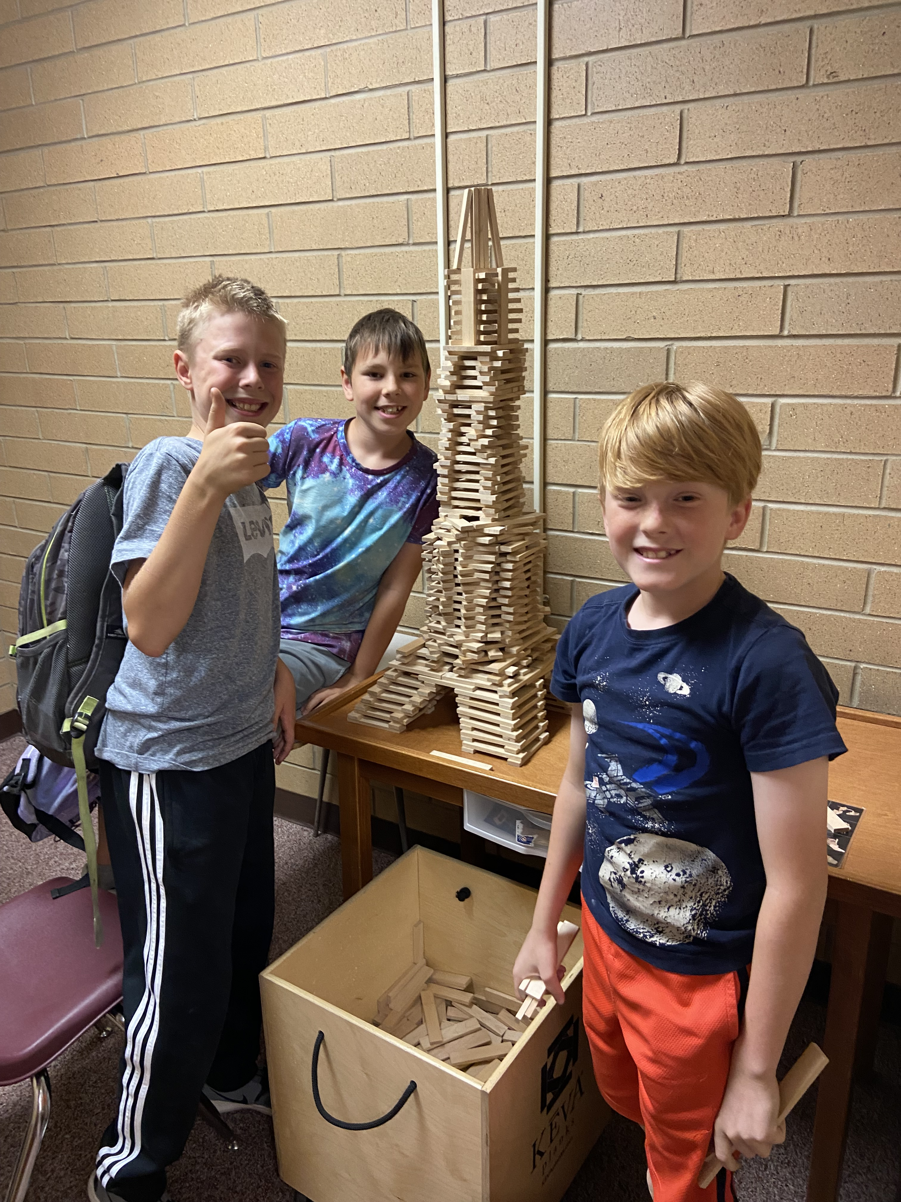 Students use blocks to recreate the Eiffel Tower