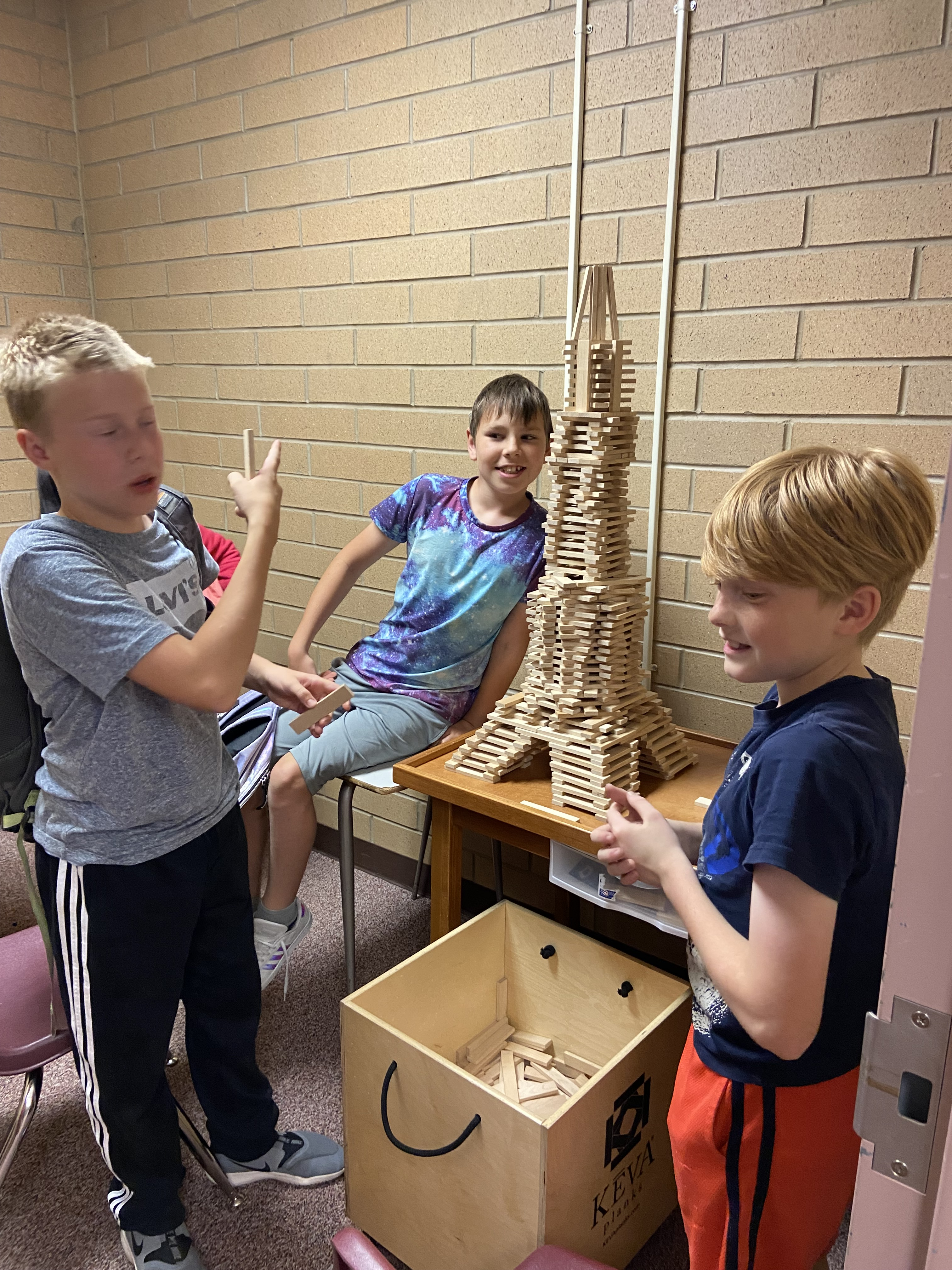 Students use blocks to recreate the Eiffel Tower