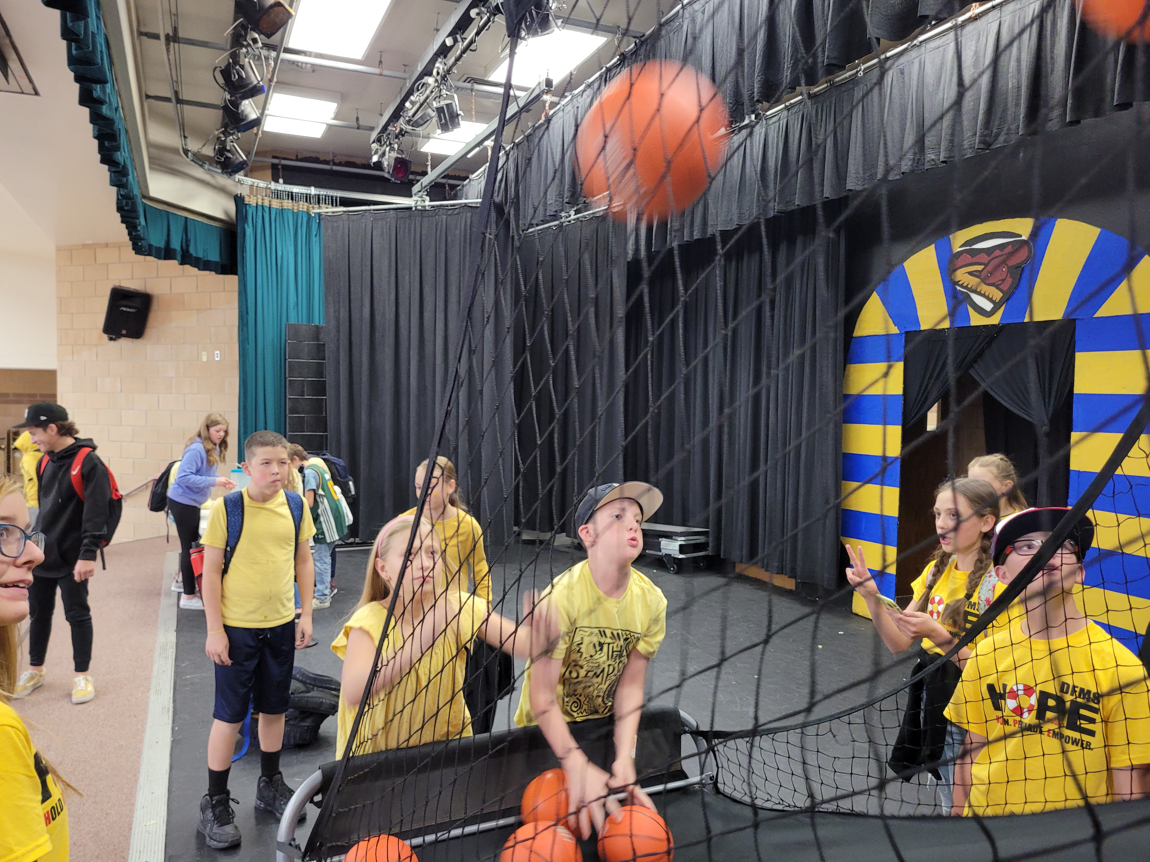 Students participate in the basketball competition