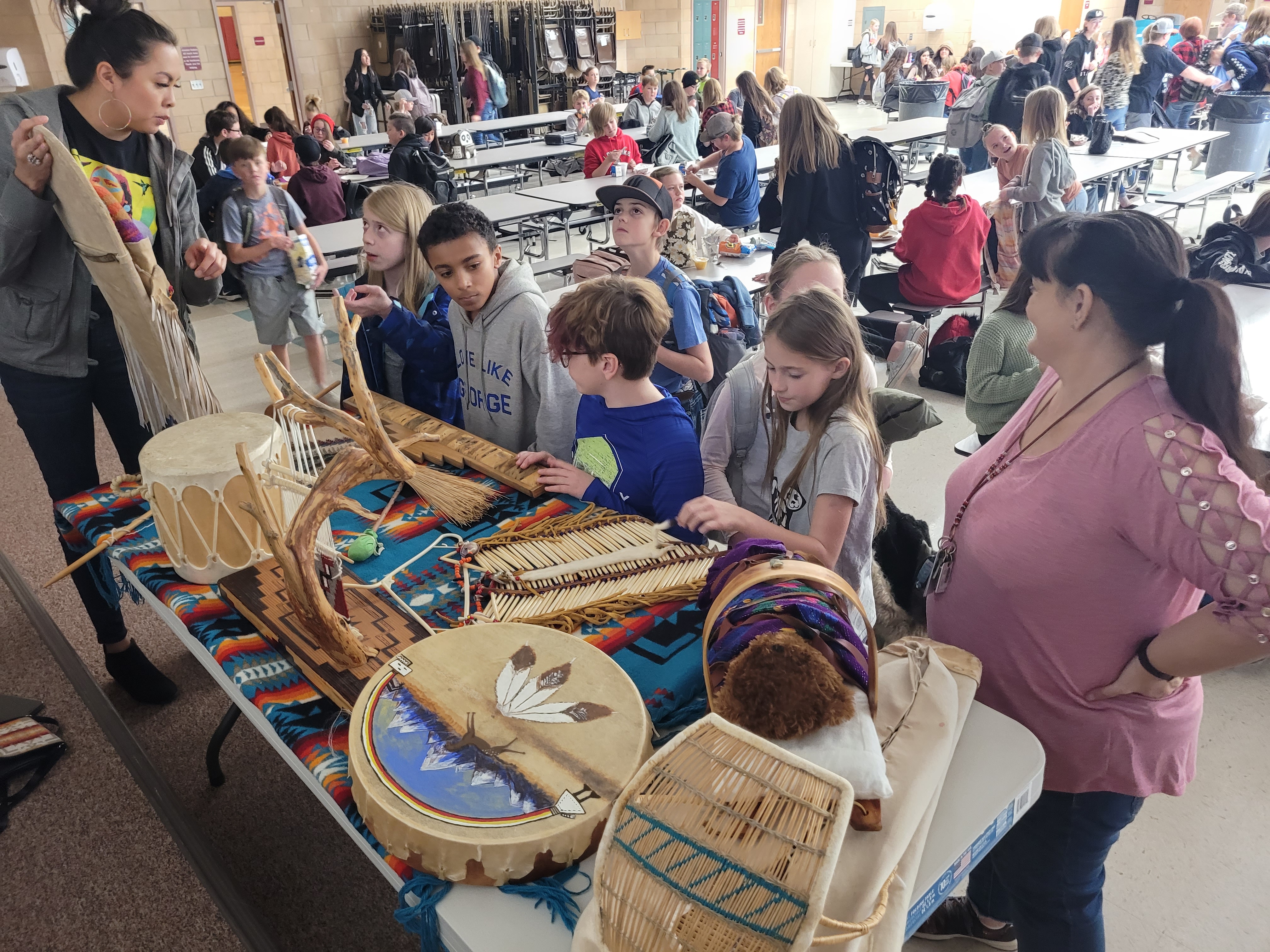 Students explore Native American artifacts during lunch