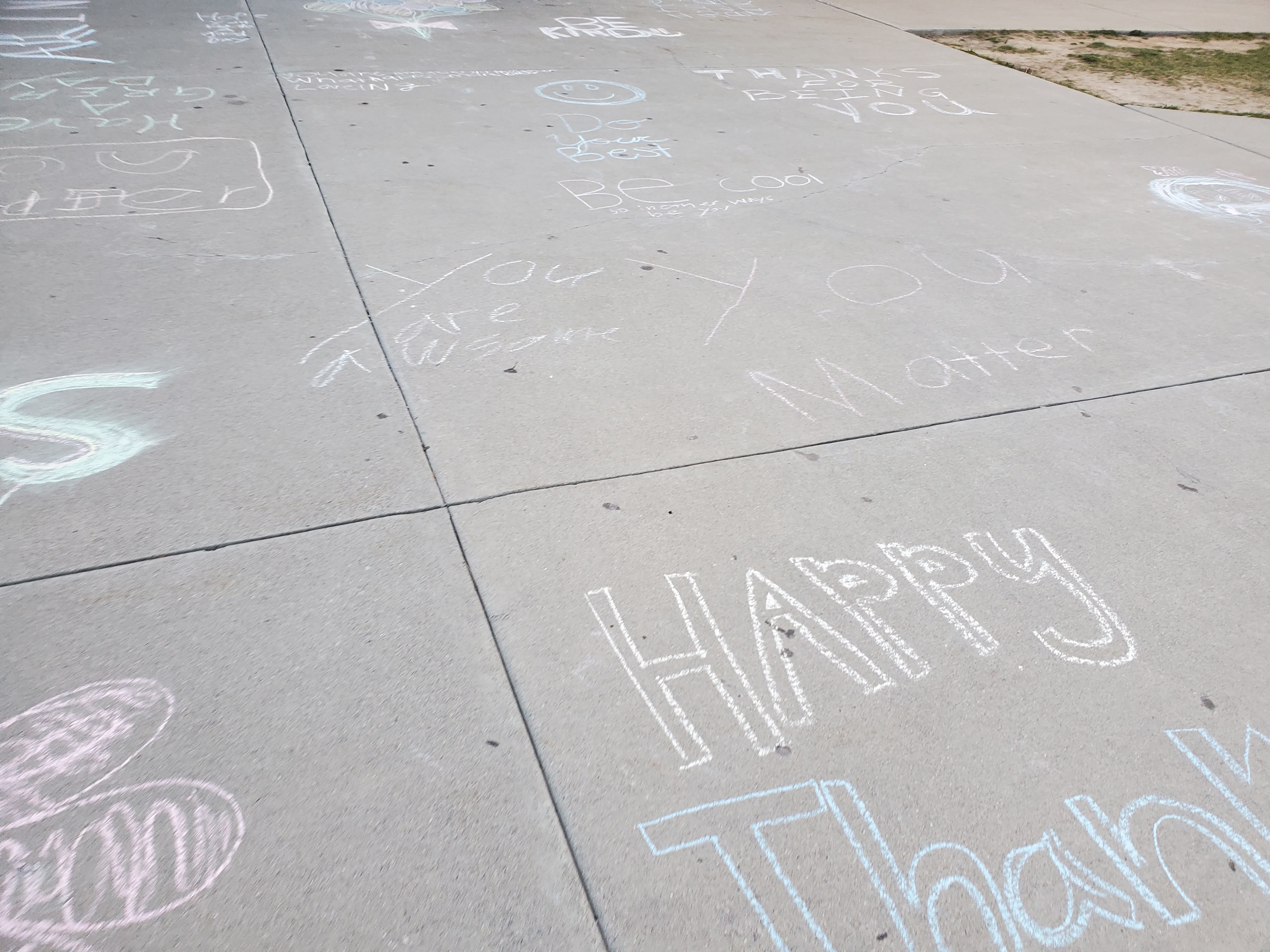Chalk messages on the front steps at DFMS
