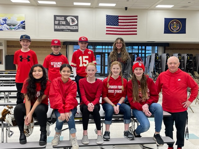 students wearing red