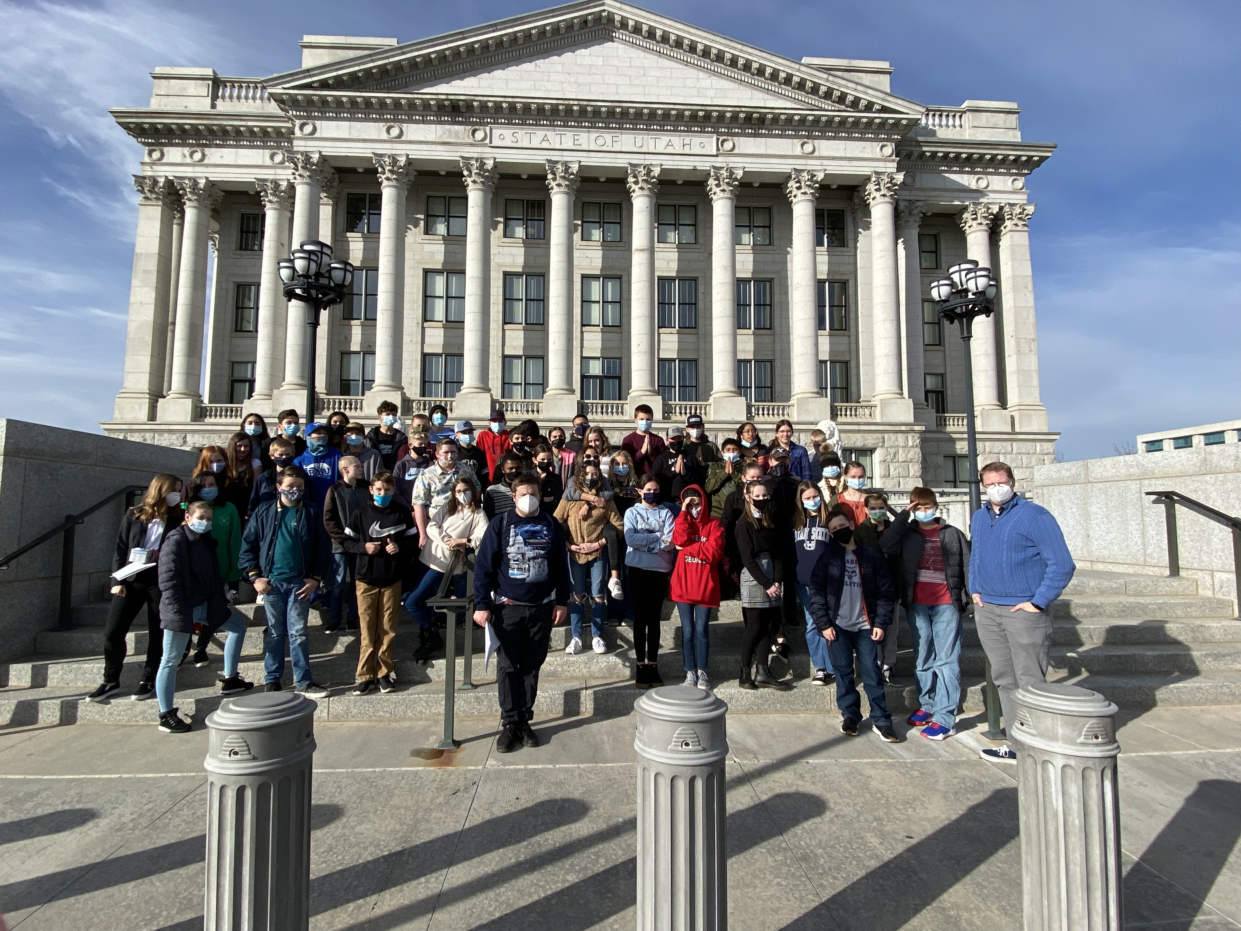 students and teacher in front of Utah Capitol