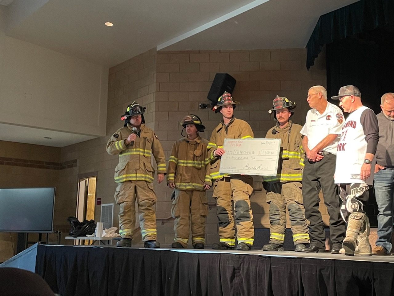 Spanish Fork Fire donating to the DFMS Make-A-Wish event
