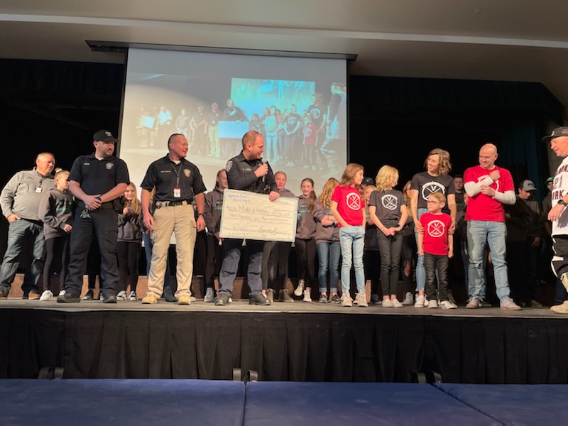 Spanish Fork Police donating to the DFMS Make-A-Wish event