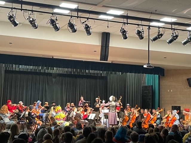 Orchestra One students in Halloween costumes performing