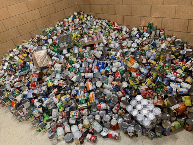 lots of canned food stacked up