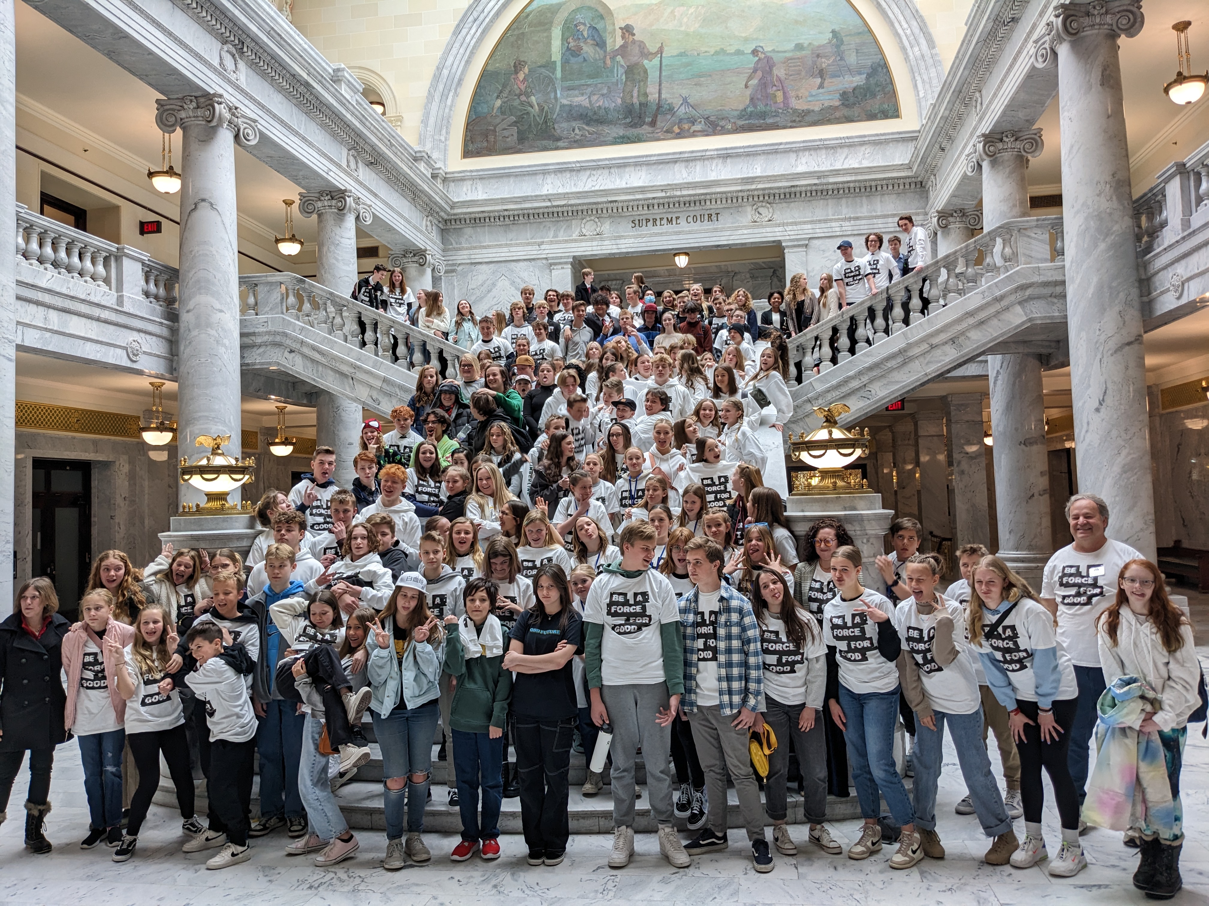 Student standing inside the state capitol with other PTSA students. 