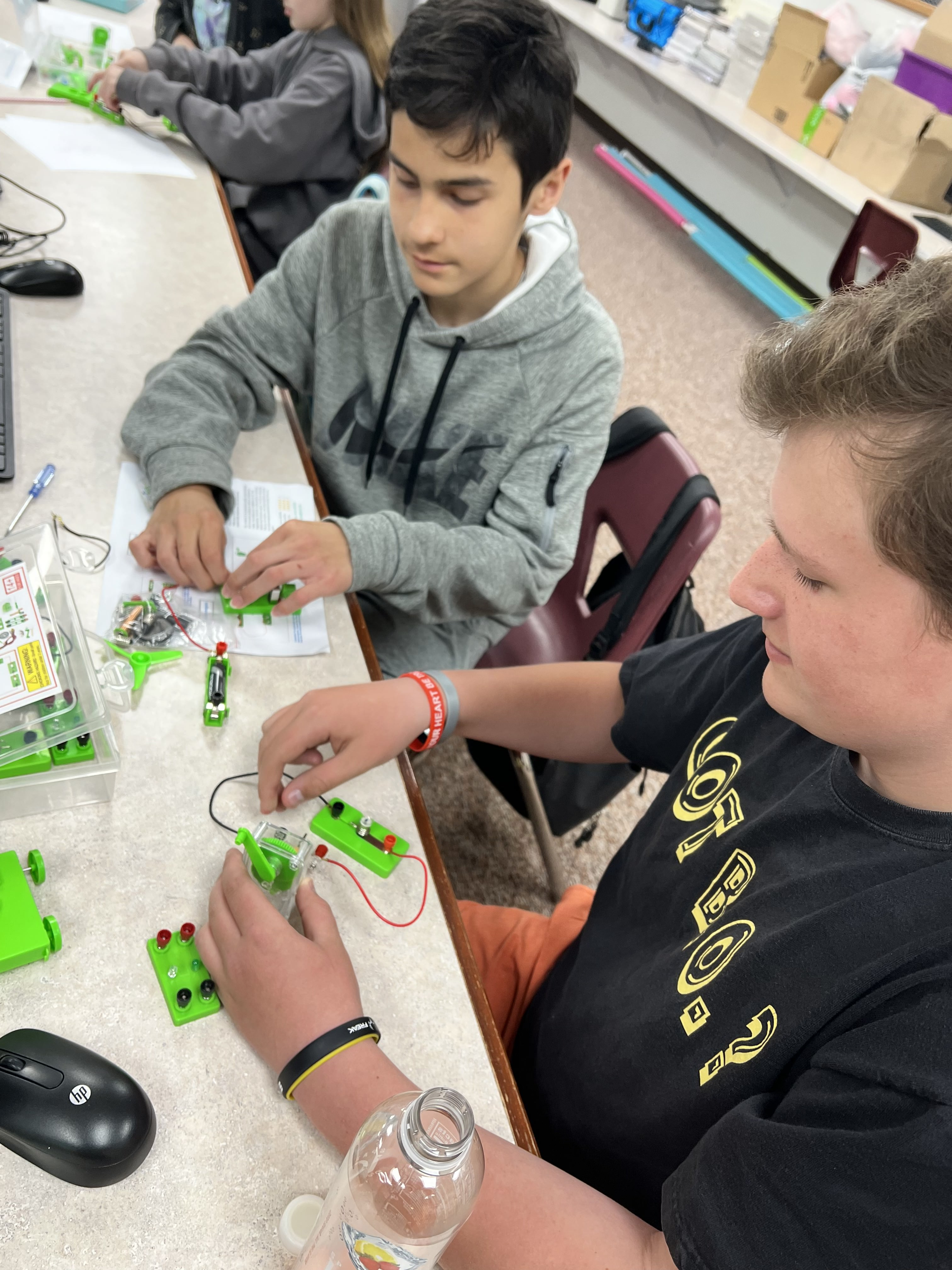Students putting together circuits