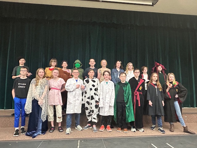 Students in costume, wizards, spacemen, a princess, Harry Potter, etc. 