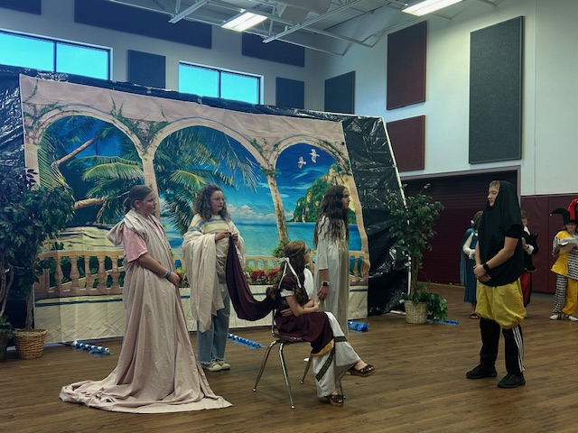 Students dressed up in costumes performing 12th Night 